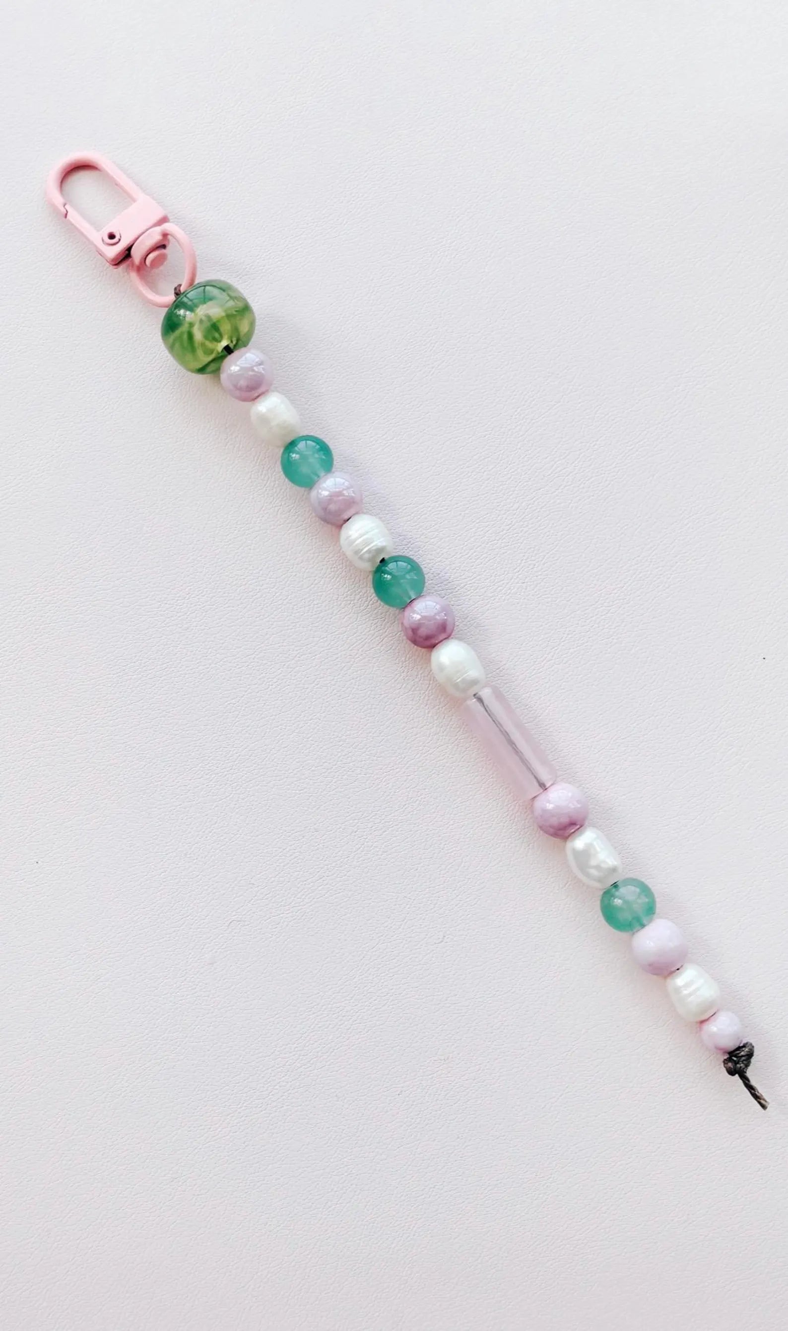 purple and green beaded keychain bag charm